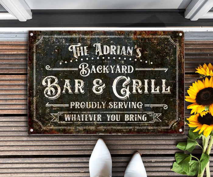 The Adrian’s backyard Bar & Grill proudly serving whatever you bring, Black Door Mat