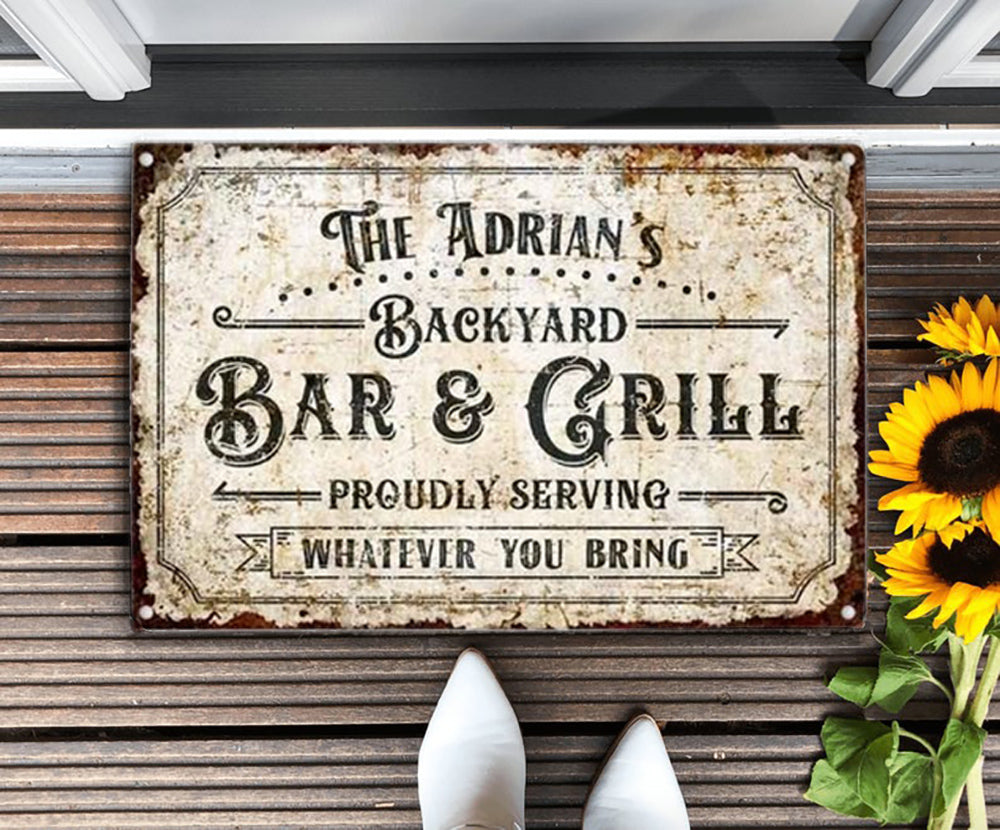 The Adrian’s backyard Bar & Grill proudly serving whatever you bring, White Door Mat